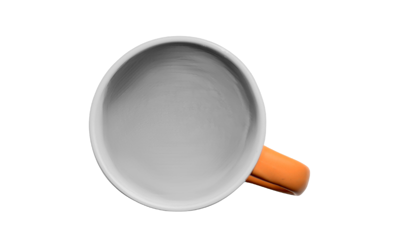 Empty Cup Coaching An empty coffee cup with an orange handle.